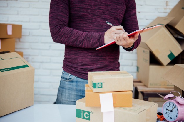 handsome young man working with papers 1150 7681